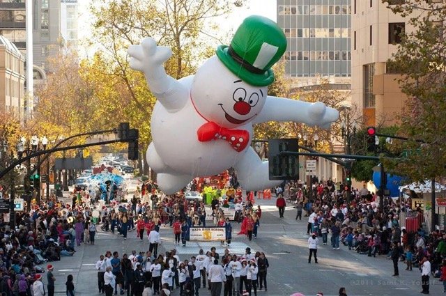 Giant snowman helium parade balloon with a bowtie